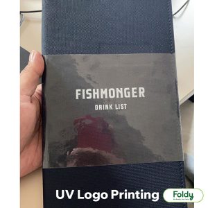 รับพิมพ์โลโก้ UV แฟ้มเมนู