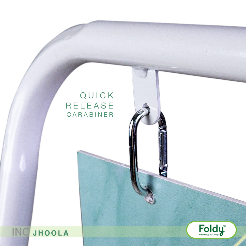 Close-up of a white frame with a silver quick-release carabiner attaching a teal panel; Foldy logo visible in the corner.