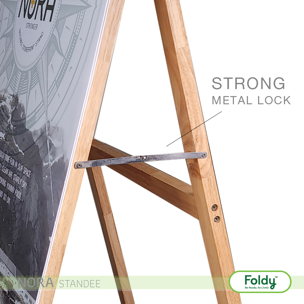 Wooden A-frame sign easel with a metal crossbar lock labeled 'STRONG METAL LOCK' and Foldy logo at the bottom right.
